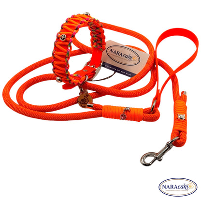 Halsband und Handschlaufenleine in Neonorange nebeneinander, Paracord-Details sichtbar