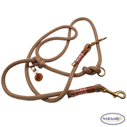 Takelung in Pastell-Bordeaux an der Paracord-Leine Beige-Gold im Detail